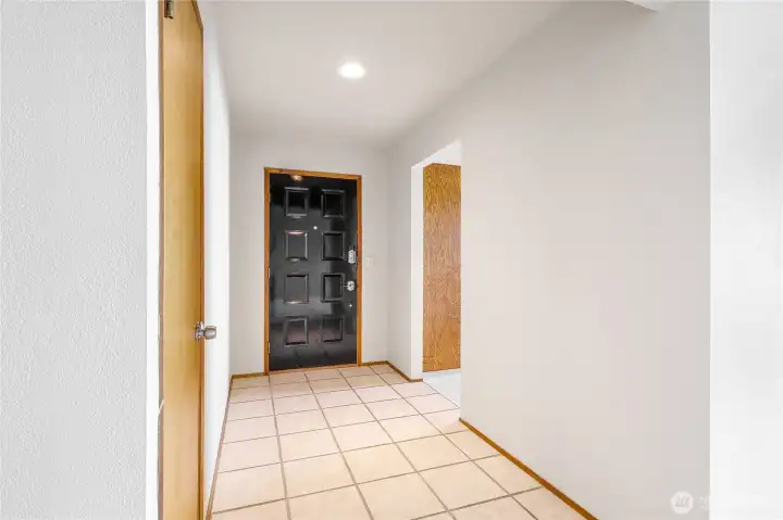 Spacious front hall with easy access to main living areas