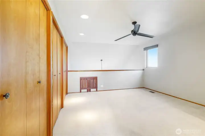 Large primary suite with peaceful lake views