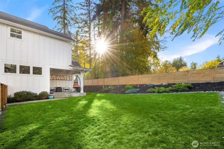 Large, fenced back yard is the biggest in the neighborhood!