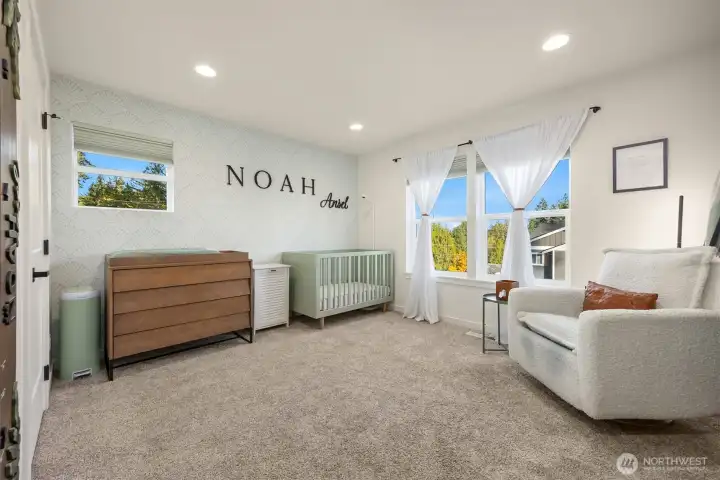 BR #3 is a charming, large space with another walk in closet