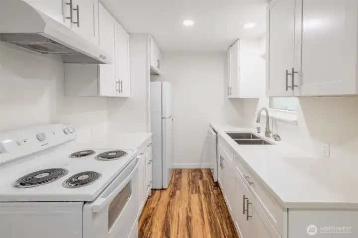 Updated Kitchen with Quartz Countertops and White Shake Cabinets