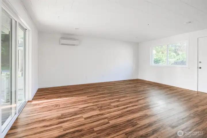 Back living room perfect for entertainment space of all kinds