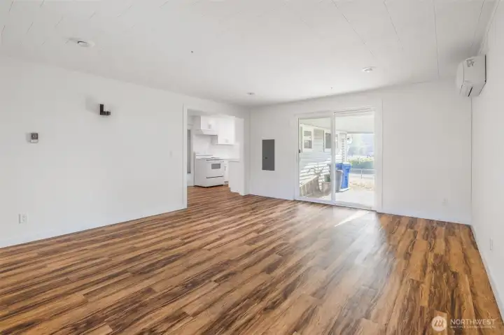 Back Living room features ductless mini split