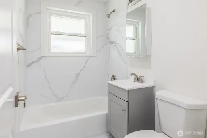 Updated Bathroom with Newer Tile and Vanita