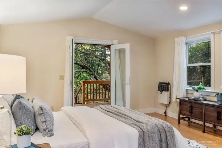French doors lead onto private deck.