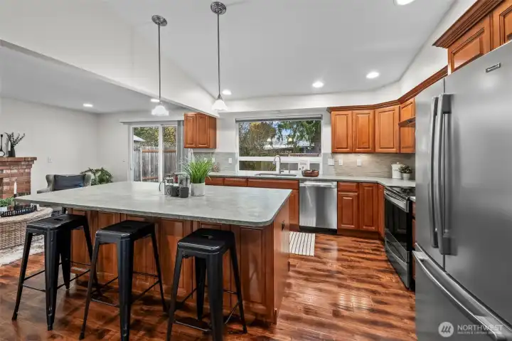 Gorgeous kitchen! Ample storage and counter space! Super elegant and unique matte granite counters