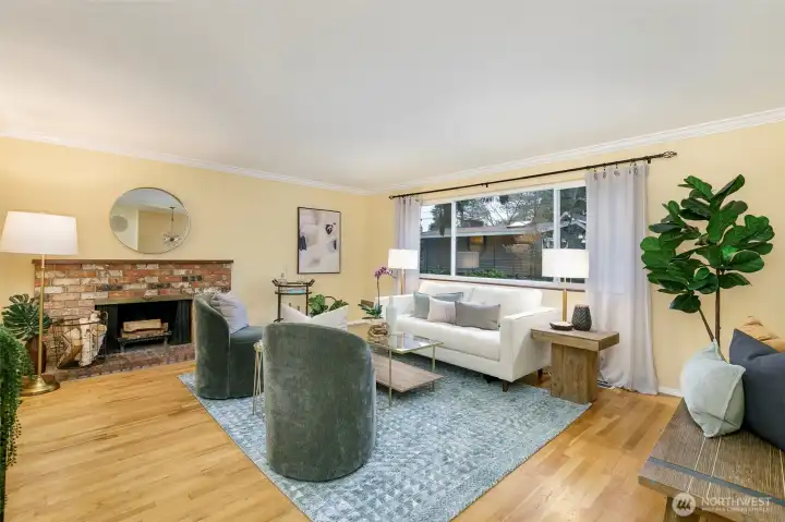 cozy wood burning fireplace there is gas heat. Hardwoods are beautiful thru-out 1st floor