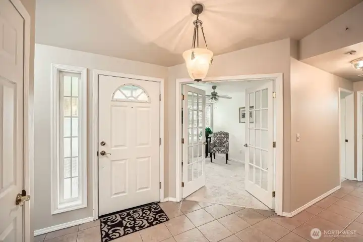 Bright and open entry & tile flooring throughout high traffic areas