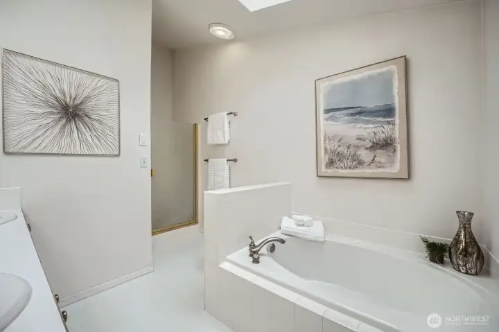 Huge soaking soaking tub, plus walk in shower