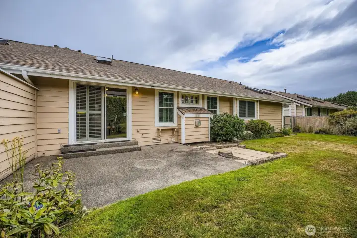 Spacious backyard is fully fenced & mowed by HOA