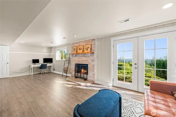 Daylight basement fully finished with addition 3/4 bathroom and wood burning fireplace and wet bar! French doors allow for separate entrance! Potential for separate living unit or rental income.