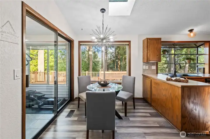 Eat in kitchen with sliding doors to sunroom