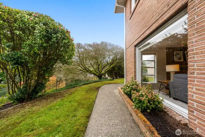 Heading from lower level entrance around the corner to the garage.