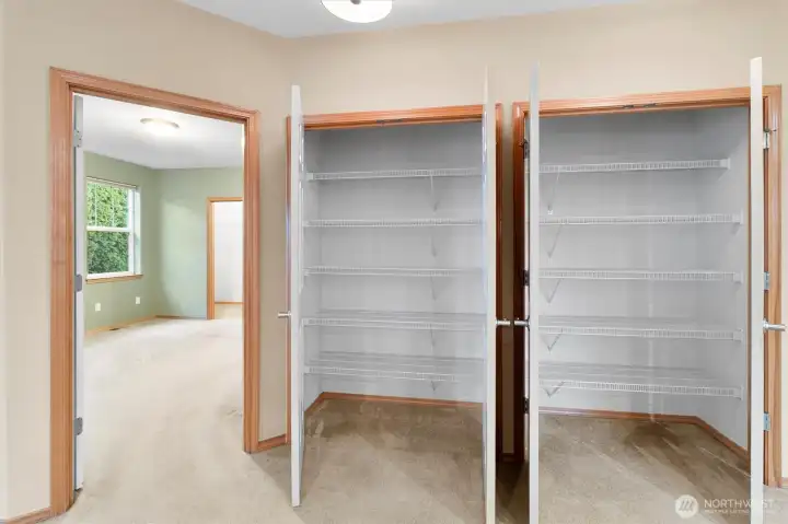 Double pantry closets with ample room