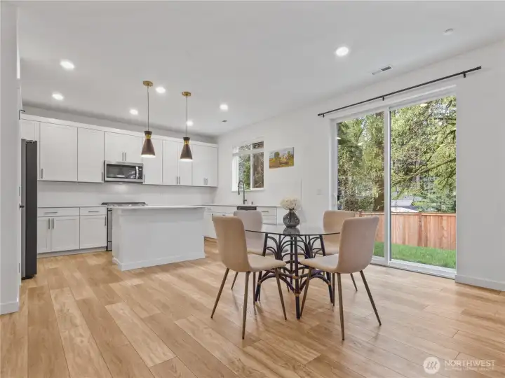 The living space is open concept with room for a larger dining table.