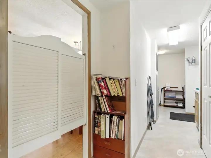 This view highlights the utility room’s tucked-away location, thoughtfully hidden from the main living areas to keep everyday mess out of sight.