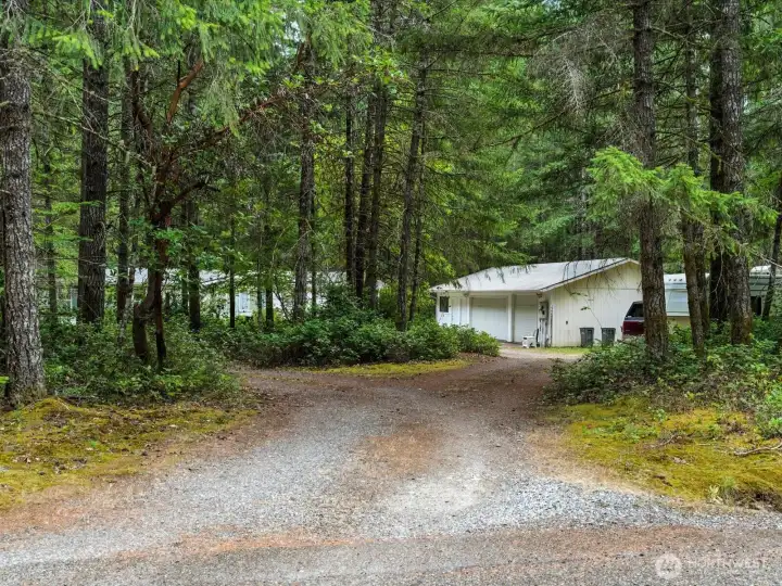 Set well off the road, the property offers a sense of seclusion and privacy, creating a peaceful retreat away from the everyday hustle.