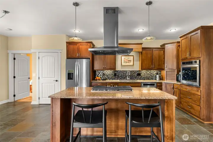 Connected, yet separate.  Table space in the kitchen ~ or flow to the covered patio for al fresco dining!