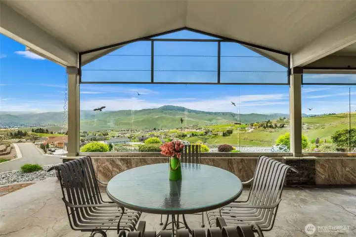 Well appointed kitchen with plenty of cabinets and reach in pantry.. a peek toward the primary