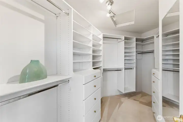 One of 2 walk-in closets in the primary suite