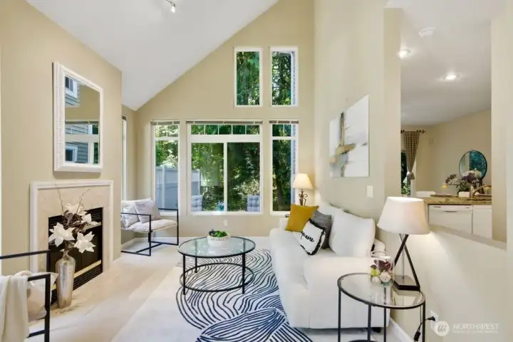 Light and open living room with fireplace! Light and open living room with fireplace!