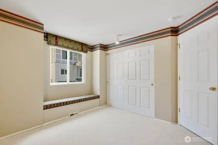 Large guest bedroom #1 with window seat and large closet! Large guest bedroom #1 with window seat and large closet!
