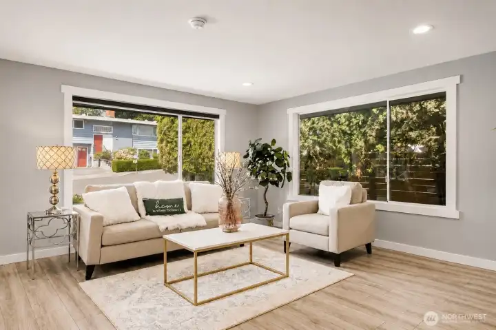 Living Room – Bright and open living area with large windows and modern finishes Living Room – Bright and open living area with large windows and modern finishes