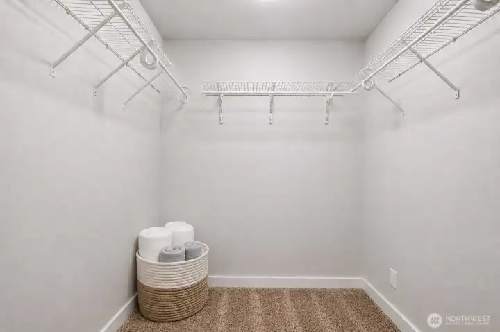 Walk-In Closet – Large walk-in closet with generous storage space Walk-In Closet – Large walk-in closet with generous storage space