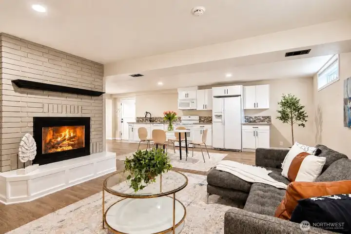 Family Room with Fireplace – Spacious family room featuring a cozy fireplace, ideal for relaxing and entertaining Family Room with Fireplace – Spacious family room featuring a cozy fireplace, ideal for relaxing and entertaining