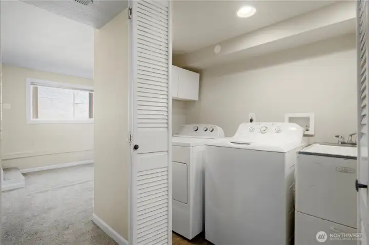 Lower-Level Laundry Room – Dedicated laundry room on the lower level providing extra functionality Lower-Level Laundry Room – Dedicated laundry room on the lower level providing extra functionality