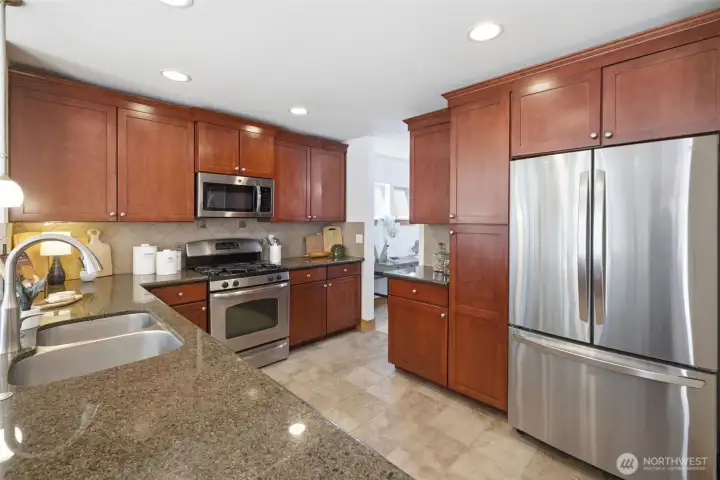 Spacious kitchen with stainless steel appliances Spacious kitchen with stainless steel appliances