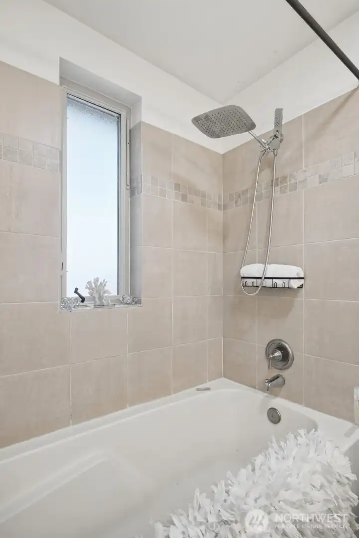 Enjoy rain shower and full tub in primary bathroom Enjoy rain shower and full tub in primary bathroom