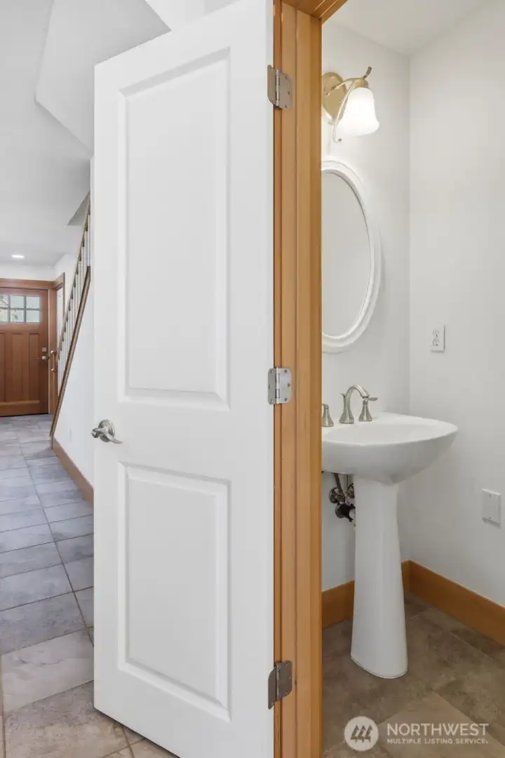 Convenient powder room near kitchen Convenient powder room near kitchen