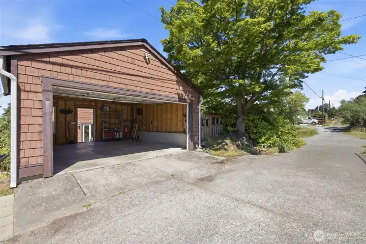 Automatic garage door opens with alley access Automatic garage door opens with alley access