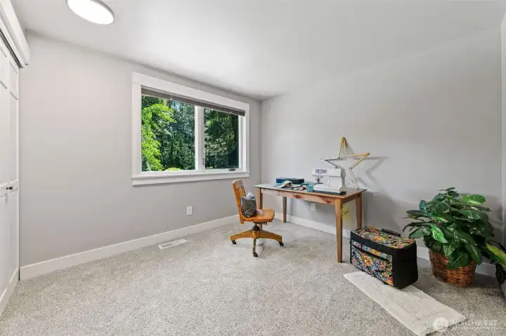 Bedroom 3 features carpet, a large picture window overlooking the backyard. Ample closet space just steps away. Don't miss the flexible layout, perfect for a home office, hobby room, or comfortable guest retreat.