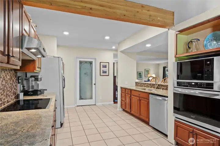 Kitchen facing Walk-In Pantry. Stainless Steel Convection Oven