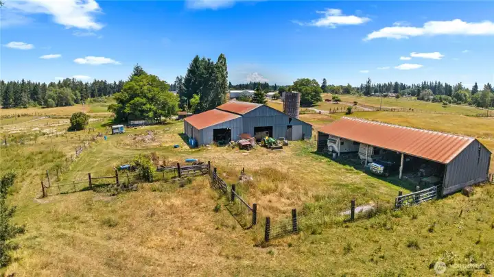 Next we have a Large 4000sqft Barn, 2000sqft Shed that holds 4+ Vehicles. Both Buildings are pole buildings with metal siding and roofs. The Fields are Fenced and Cross-Fenced with multiple gates.