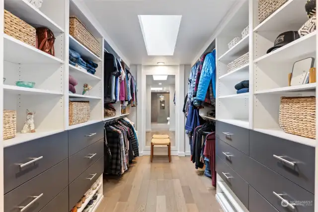 Full sized walk in closet with custom built-ins.