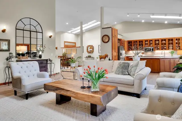 Stunning open concept great room with soaring 15+ foot ceilings