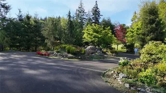 CIRCULAR DRIVEWAY - Pond in middle. Plenty of Guest Parking!!!
