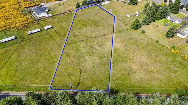 Level, two acre parcel of land. Ready for your development. Blue boundary lines are approximate. Buyer to verify to their own satisfaction.
