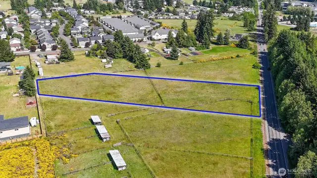 Located on the main road in and out of Yelm, enjoy all of the city limits while still having county jurisdiction. Blue boundary lines are approximate. Buyer to verify to their own satisfaction.