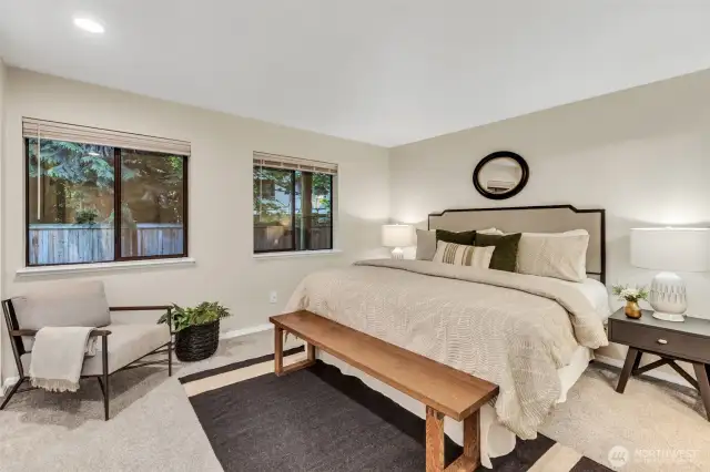 Spacious primary suite offering comfort, privacy, and style
