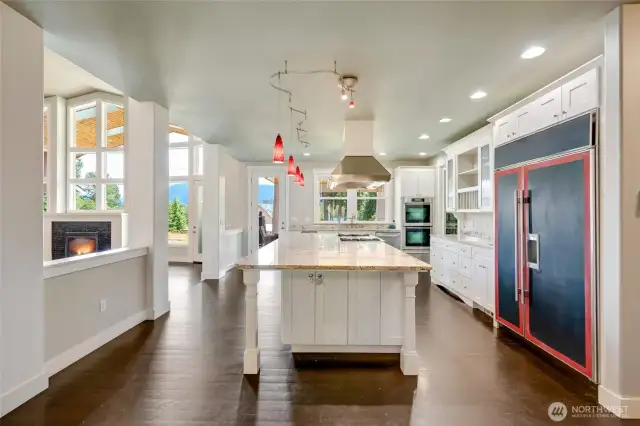 Sub zero fridge with granite slab counters