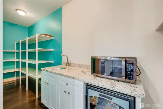 Butlers pantry with sink and wine fridge