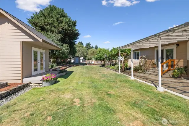 Perfect yard for entertaining and easy walk to Creative Cottage, chicken coop, livestock area and garage.