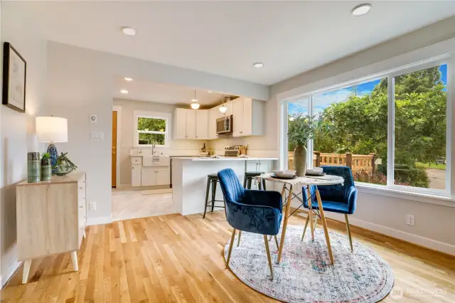 “Dinner parties, game nights, or lazy Sunday brunch—this open layout makes it all feel easy and inviting. Note the refreshed lighting throughout and did we mention all of the electrical has been replaced!