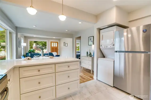 All new kitchen appliances include a refrigerator and a washer-dryer combo conveniently located to make one level living a breeze in this thoughtfully updated space.