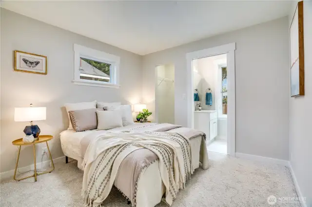 New windows, trim, lighting, carpet, and paint elevate the primary suite—plus a refreshed half bath for added convenience.