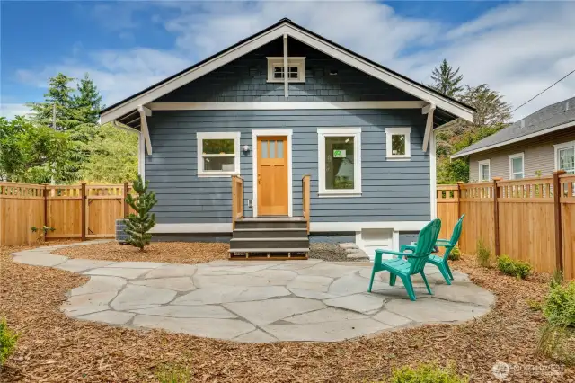 Soak up the sunshine and unwind on the new backyard flagstone patio—a perfect spot for a picnic table to gather with friends or a cozy fire pit to enjoy crisp evenings under the stars.